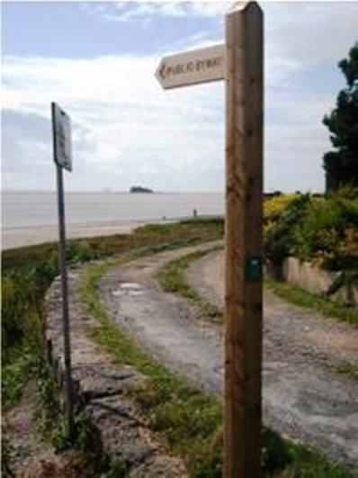 Sign pointing the way across the Sands to Chapel Island and Cark