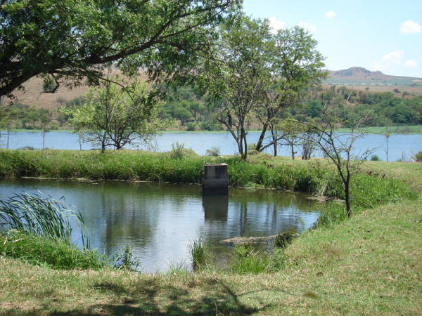 Small Dam with Lake Heritage in background