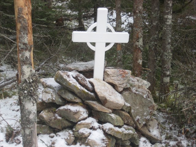 stone cairn and memorial cross