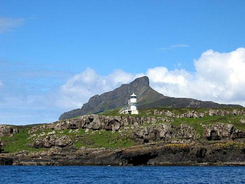 Eigg with An Sgurr - our target - beyond the lighthouse