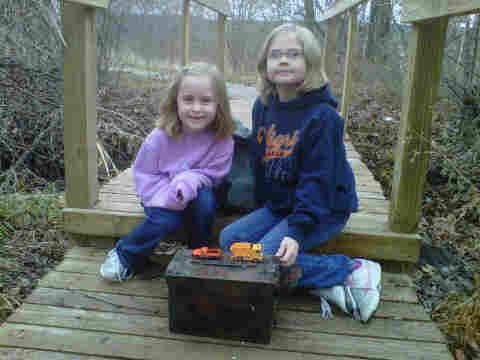 My daugters with a cache.