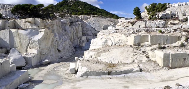 How is marble formed from limestone?
