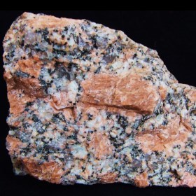 A typical example of Shap granite. Note the large pink orthoclase feldspar phenocrysts surrounded by a groundmass of smaller crystals