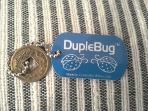 duple bug with chinese coin