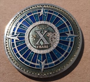 10 Years of Geocaching Multi Event Geocoin - ON fr