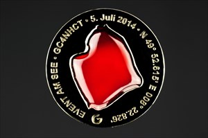 Event am See Geocoin Vulkano Red Edition