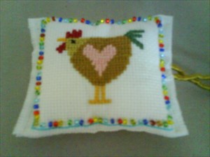 Front view of the Cross-Stitch Cushion
