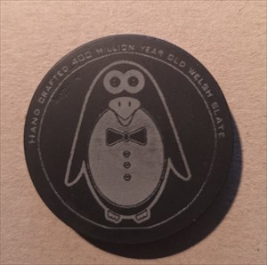 Eclectic Penguin Geocoin - Welsh Slate front