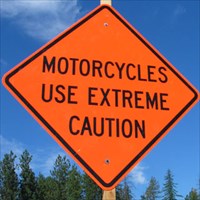 md+motorcycles_use_caution_sign