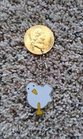 Dove and Gold Coin Travel Bug