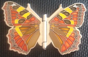 Butterfly Geocoin - Aglais urticae front