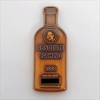 Absolute Caching Geocoin front