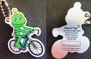 Signal the Frog on his Caching Bike