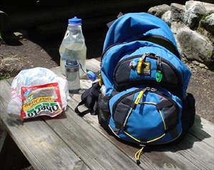 My backpack next to lunch while geocaching