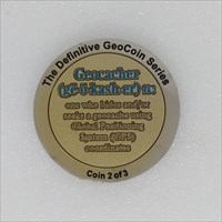 The Definitive Coin Series Geocoin - 2 of 3 front