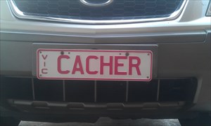 The CACHER numberplate