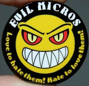 Evil Micros 2011 Geocoin red eyes front