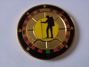 The Casino Geocoin gold front