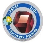 luzzi1971&#39;s EarthCache Discovery Award Tag Garnet
