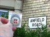 The coin with an "Anfield Road" Sign