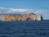 Percé Rock Nearby Percé Rock. It is a massive limestone stack 433 metres (1420 ft) long, 90 metres (296 ft) wide and 88 metres (289 ft) at its highest point.