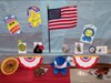 "Dad's & Flags" Tour Group The Travel Bugs Celebrate Flag Day and Fathers Day at they enter a beautiful summer in Michigan. Shown are TB&#39;s: LZ33&#39;s Cache Critter Coin, Tikibirds Gold Coin, Adopted Critter, Where&#39;s the Herd, Borsele Netherlands UD, Two Seasons, Nuts to You Too, Monkey Fist, Lost Scouts Token #6, Texans Vistory Truck.