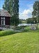 Utsikt från gamla kvarnen i Åmsele med Åman i bakgrunden.  Loggbild uppladdad från Geocaching®-appen