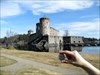 At the Olavinlinna castle in Savonlinna, Finland. Mga geocoin II in Savonlinna, Finland (Olavinlinna castle on the backround) on April 24, 2011, The Easter Sunday.