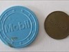 Två poletter 3 oktober, andra sidan One promotional &quot;coin&quot; - maybe from the 70&#39;s - in blue plastic and one token with forgotten purpose, added to the pouch Oct 3. This is the other side.