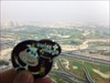 At least some grass Picture from my balcony of the swiss cow with the Emirates Golf course in Dubai in the background.
