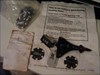 This is what i found The Stealth Plane, Block of wood, the travel bug, 11 poker chips, a cache log(left Jan 13,2007 sunny,clear, no snow,   -4C). all the stuff was in a plastic bag, in a plastic container.
