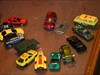 My fleet wondering why the "dog tag"? All these match-book size cars were taken in trade at geo-caches.