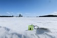 Bugsy on the ice of Lake Kallavesi, Finland In this photo Bugsy the Travel Bug is in Kuopio, in Eastern Finland. After enjoying the great view on the ice of Lake Kallavesi Bugsy went to a nice wooden cache hidden to the beautiful Quarter Block Museum.