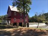 This mill was in the movie “Sweet Home Alabama” with Reece Witherspoon in 2002. 
The first mill in this spot was built in 1825. Hilliard Starr owned and named the mill from 1866-1879. A few of the old log mills had burnt down. This building was built in 1907.  Log image uploaded from Geocaching® app