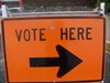 Gary on the sign directing voters.