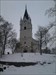 Sunne kyrka. Den närbelägna Sunne kyrka, i vinterskrud, skall även vara den största i Värmland.