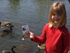 Cassie and Jenny feeding geese in Kennewick, WA