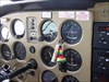 On the instrument panel... Tawia on the instrument panel of a Cessna 172 at an altitude of 4,200 feet.