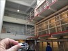Battle of Alcatraz A convict climbed the wall to left and used a bar spreader to over power the guard in the catwalk.   Then as guards investigated, the convicts would capture them and lock them in cell 402.   When the  escape attempt went south, they shot the guards in place in cell 402.