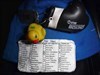 Geo.Duck+TB3KXG2-1 Updated travel log sheet by the travel bug &quot;Reggie&quot; (TB3KXG2) while the Geo.Duck (a yellow rubber ducky) looks on