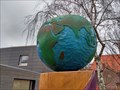 Image for Globe at the top of a carved wooden trunk - Hamburg, Germany