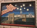 Image for Firehouse garage door with mural memorializing firefighters - NYC, NY, USA