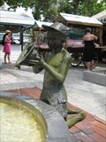 Image for Boy pouring water out of a conch - Key West, FL