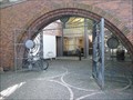 Image for Untitled - Bronze gates integrated with brick wall entrance to the library