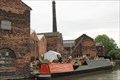Image for "Narrowboat returns to Middleport Pottery" - Middleport, Burslem, Stoke-on-Trent, Saffordshire, UK.