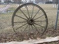 Image for Worn Wooden Wagon Wheel – Sioux Center, IA