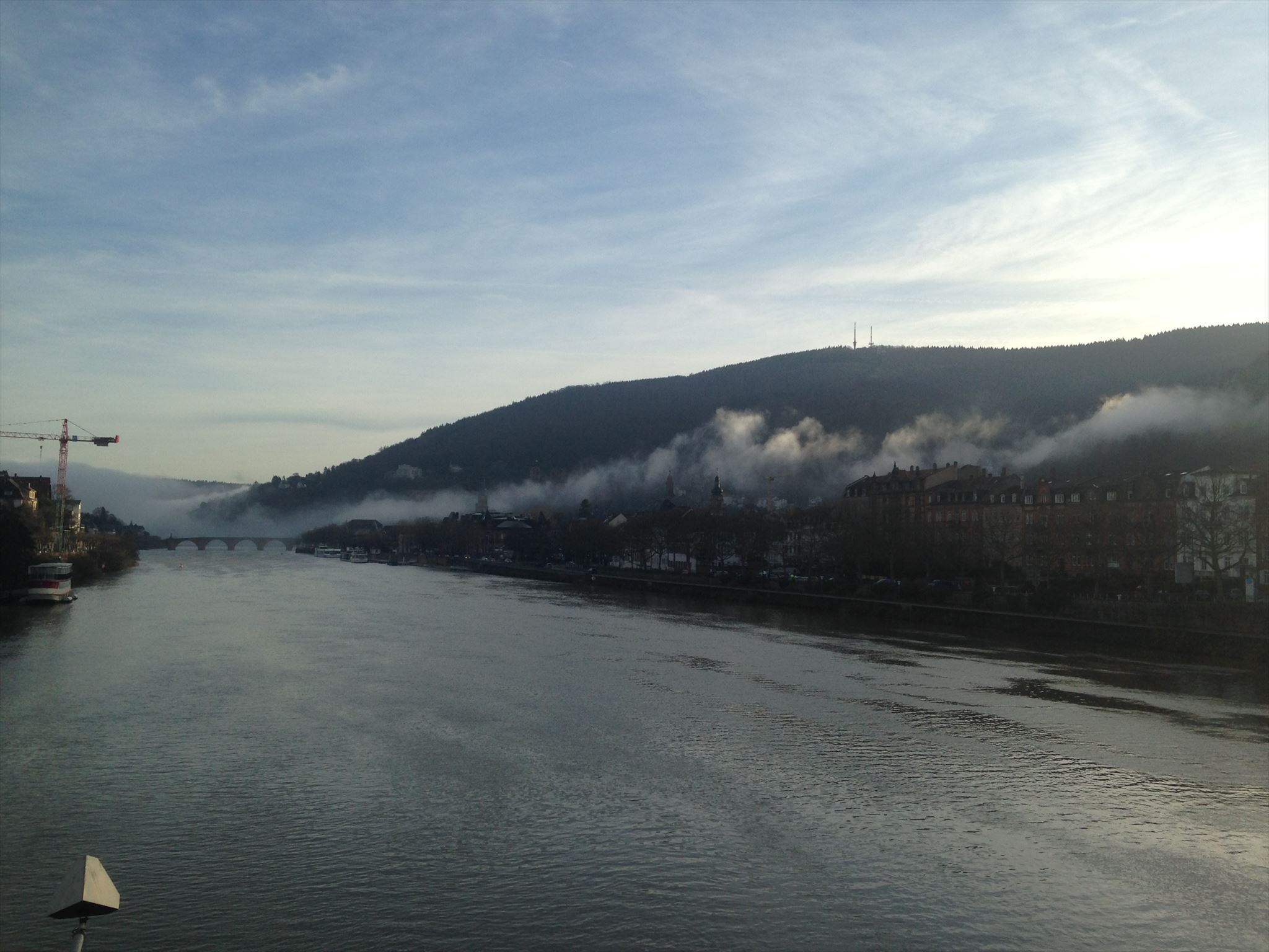 A picture of foggy Heidelberg and the river Neckar.